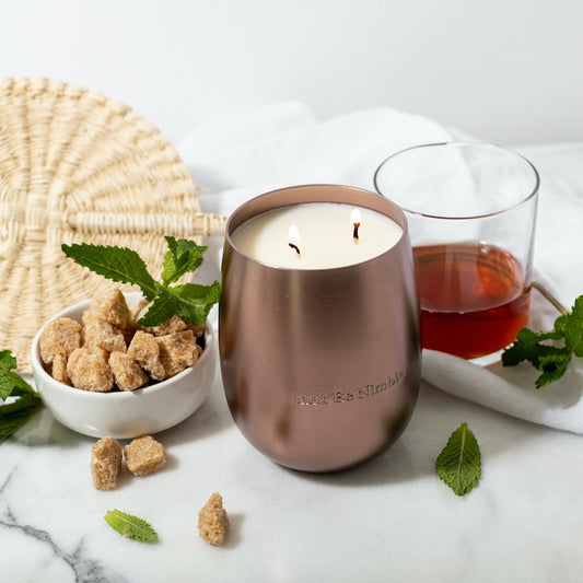 17.5oz Derby Metallic Bronze Soy Candle in brushed aluminum vessel with bourbon-mint scent.